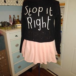 School girl, 7, pink pleated  skirt. Made in Asia